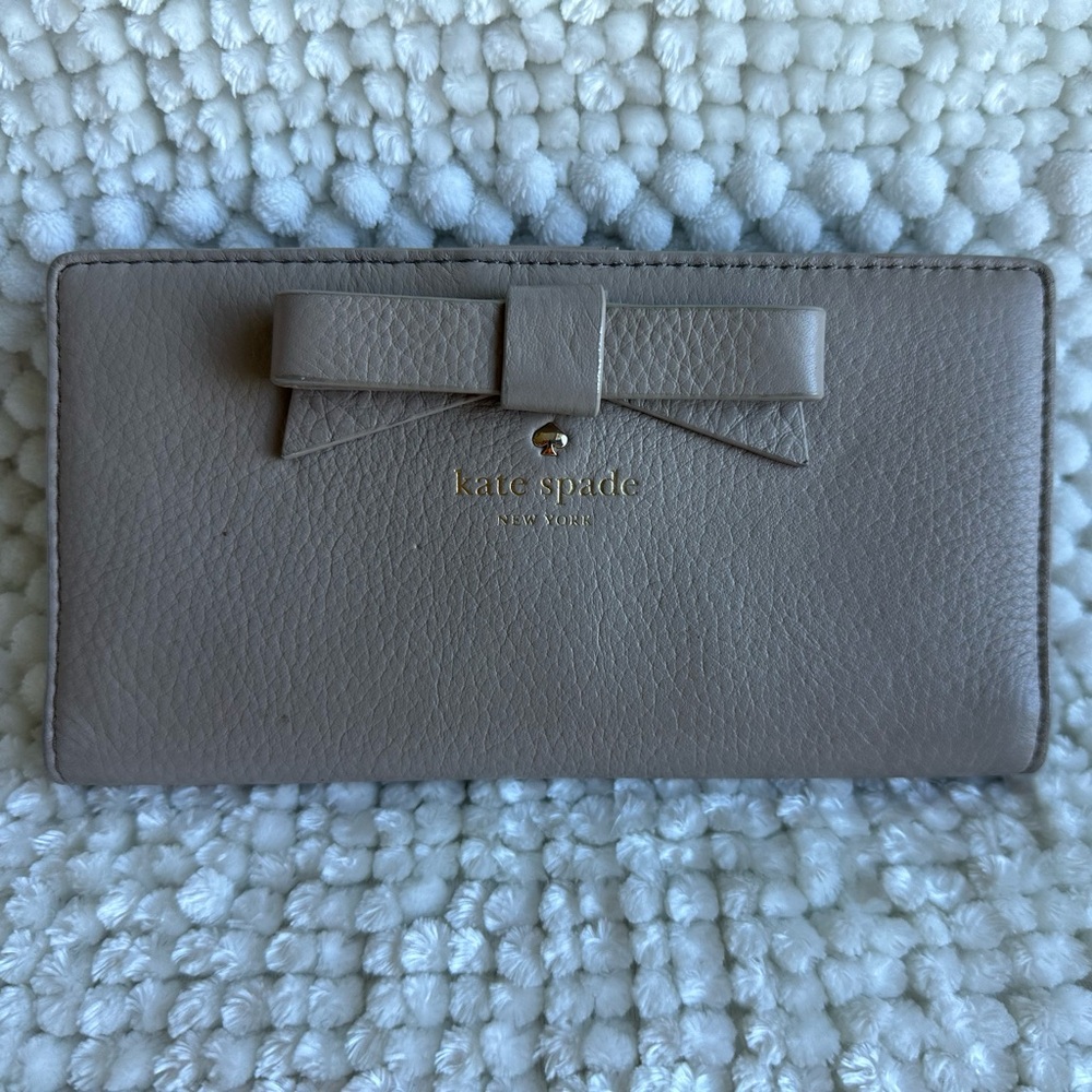 kate spade Tan Pebble Leather Clock Tower Bi-fold Bow Wallet